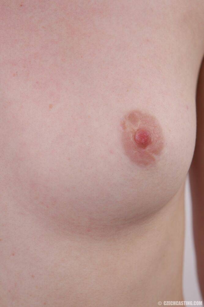 Blonde teen Lucie sports a pierced nipple while making her nude debut - #7