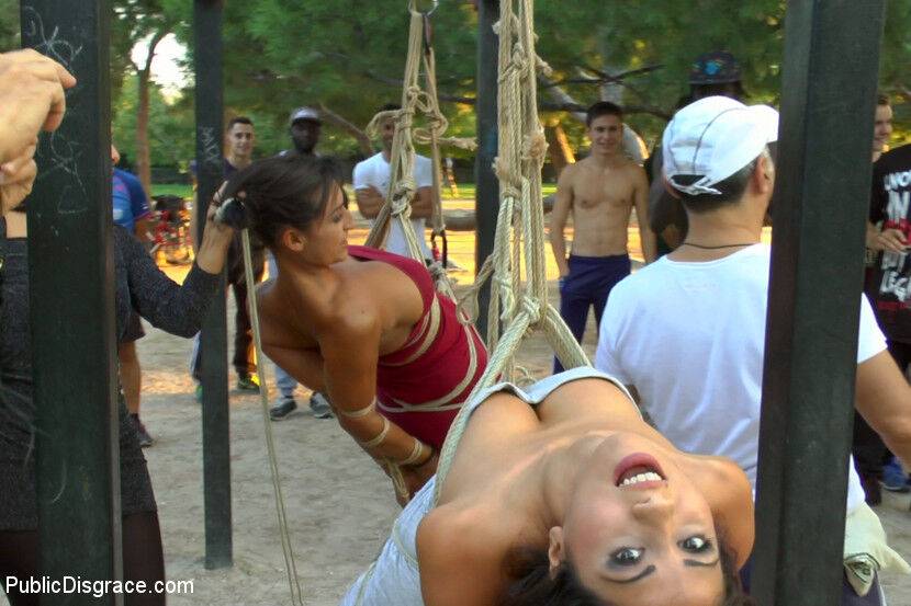 Beautiful girls are tied together during a public humiliation session - #10