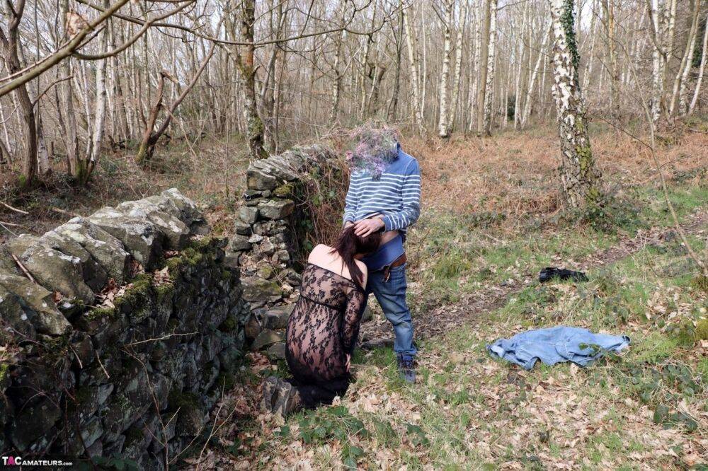 Busty UK amateur Juicey Janey gets banged up against a dry stacked stone wall - #7
