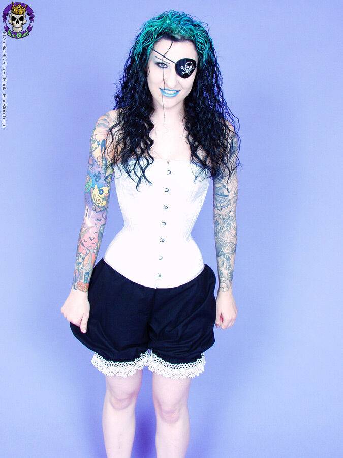 Gothic tattooed pirate girl smirks sexy - #11