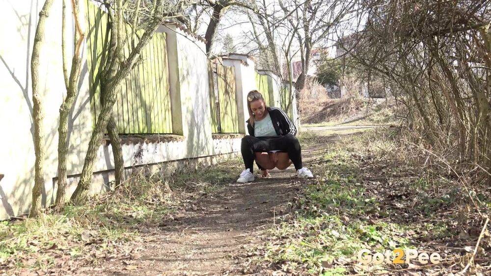 Naomi Benet pees near abandoned building - #3