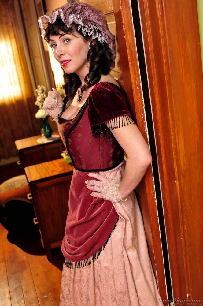 Hot mature brunette RayVeness shows sexy cleavage wearing medieval costume - #5