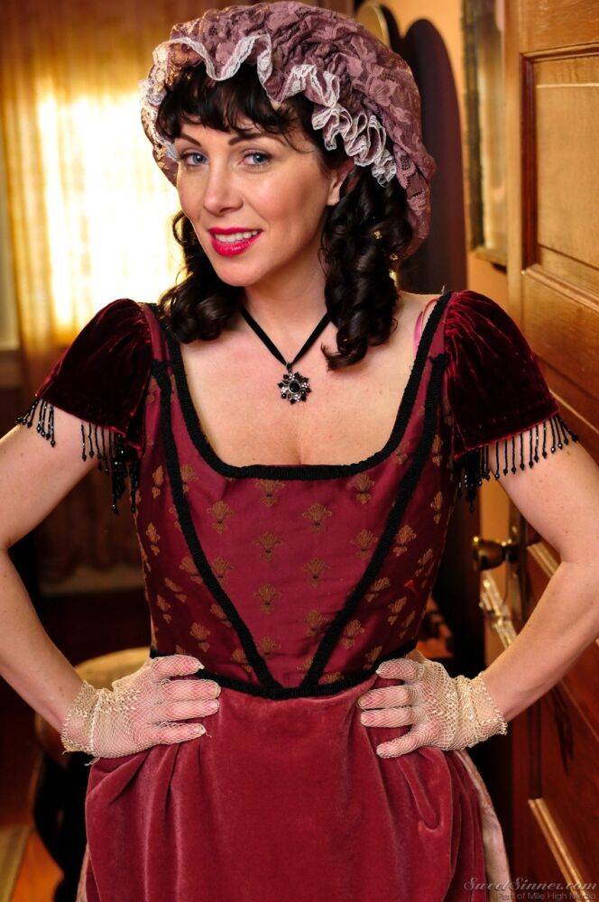 Hot mature brunette RayVeness shows sexy cleavage wearing medieval costume - #1