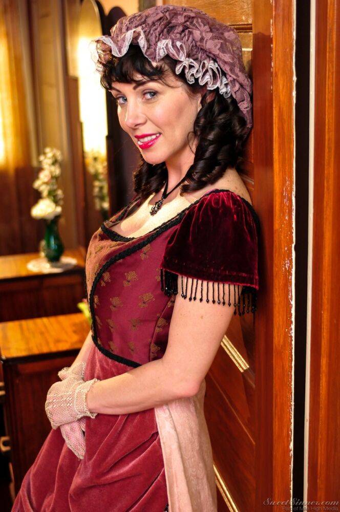 Hot mature brunette RayVeness shows sexy cleavage wearing medieval costume - #9