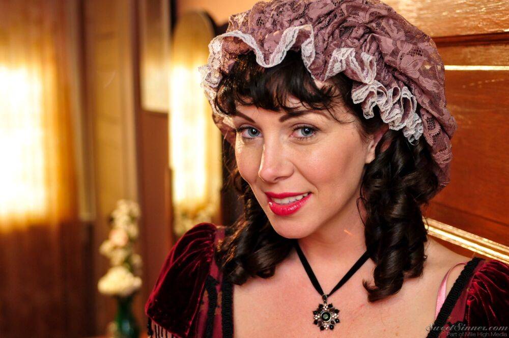 Hot mature brunette RayVeness shows sexy cleavage wearing medieval costume - #4