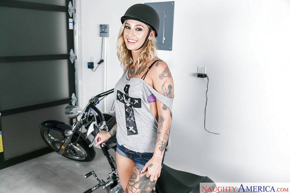 Tattooed MILF Kleio Valentien undressing for nude spread on motorcycle - #15