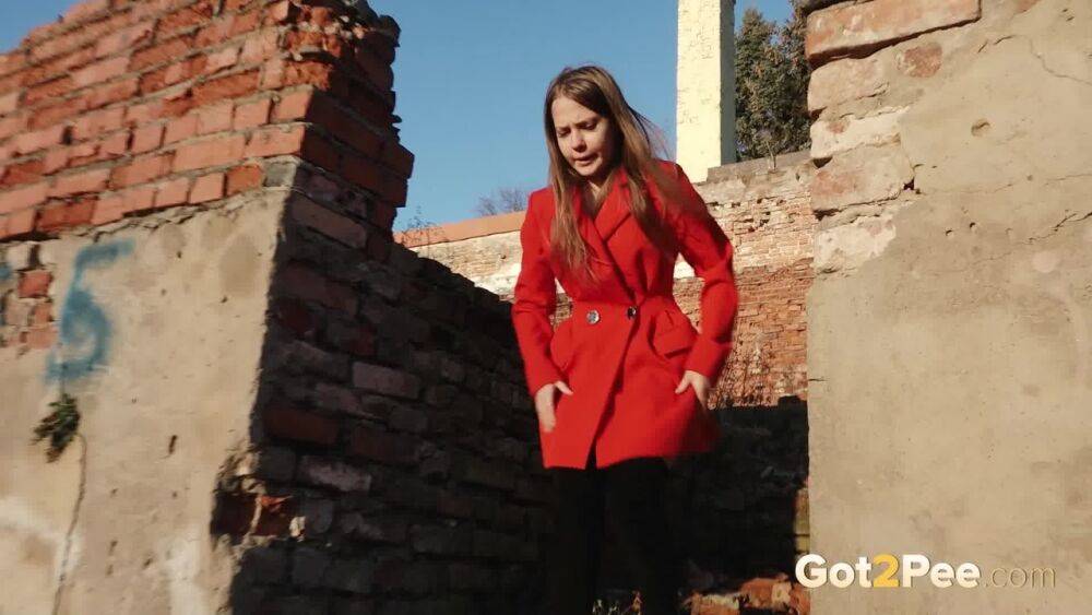 Caucasian girl Nastya takes a piss behind the remnants of a brick house - #4