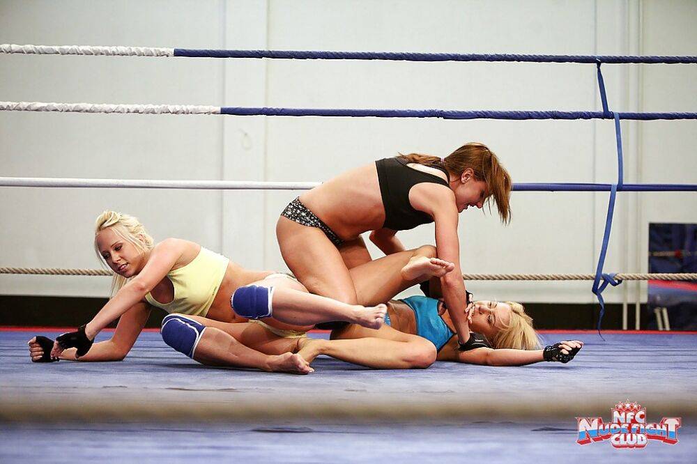 Wild women wrestling ends up with passionate lesbian threesome sex - #13