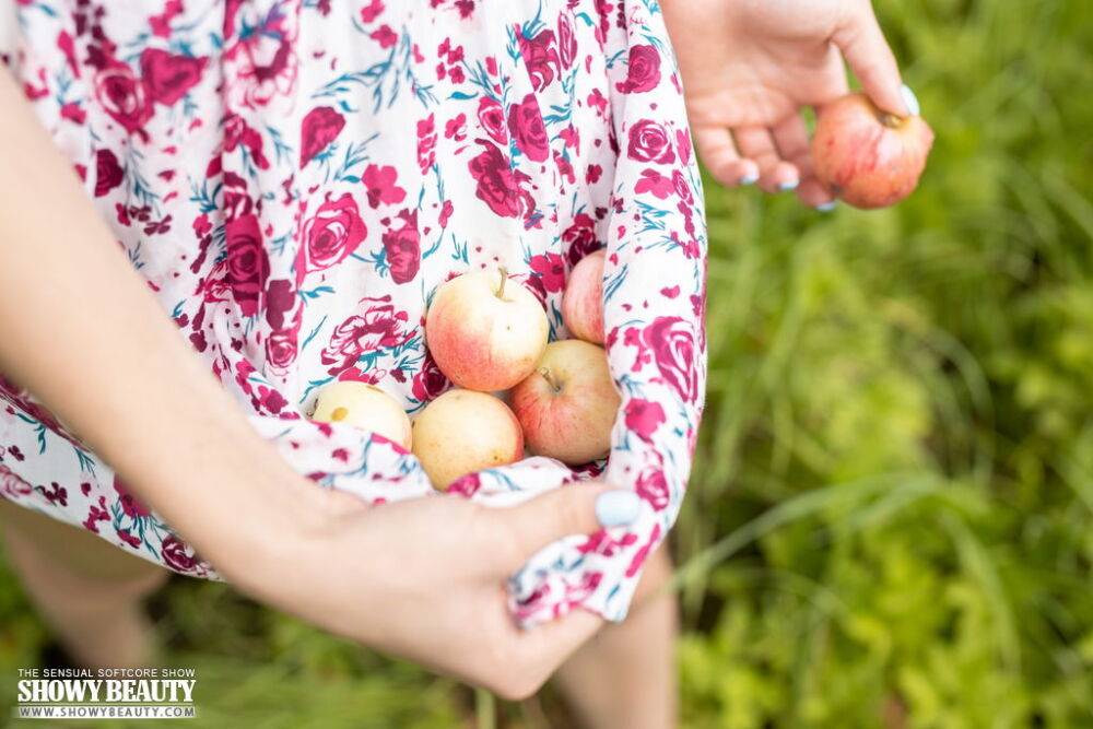 Young redheaded Agata gets naked on a blanket while picking wild apples - #16