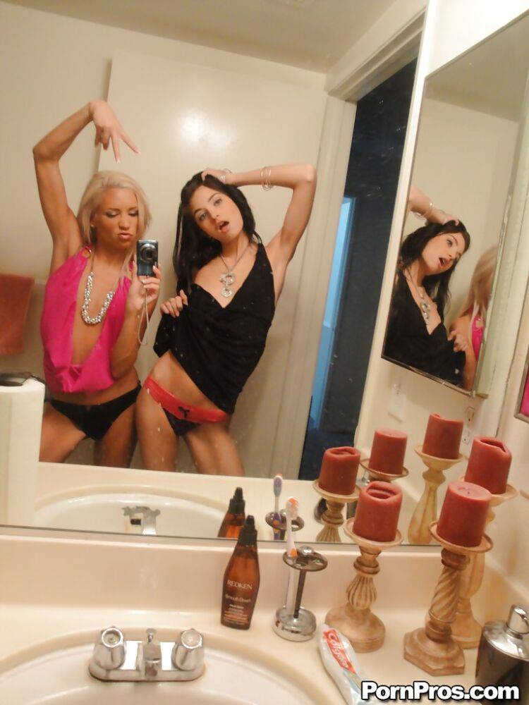 Skinny girls Kacey and Zoey showing off teenie tits while taking mirror selfie - #5