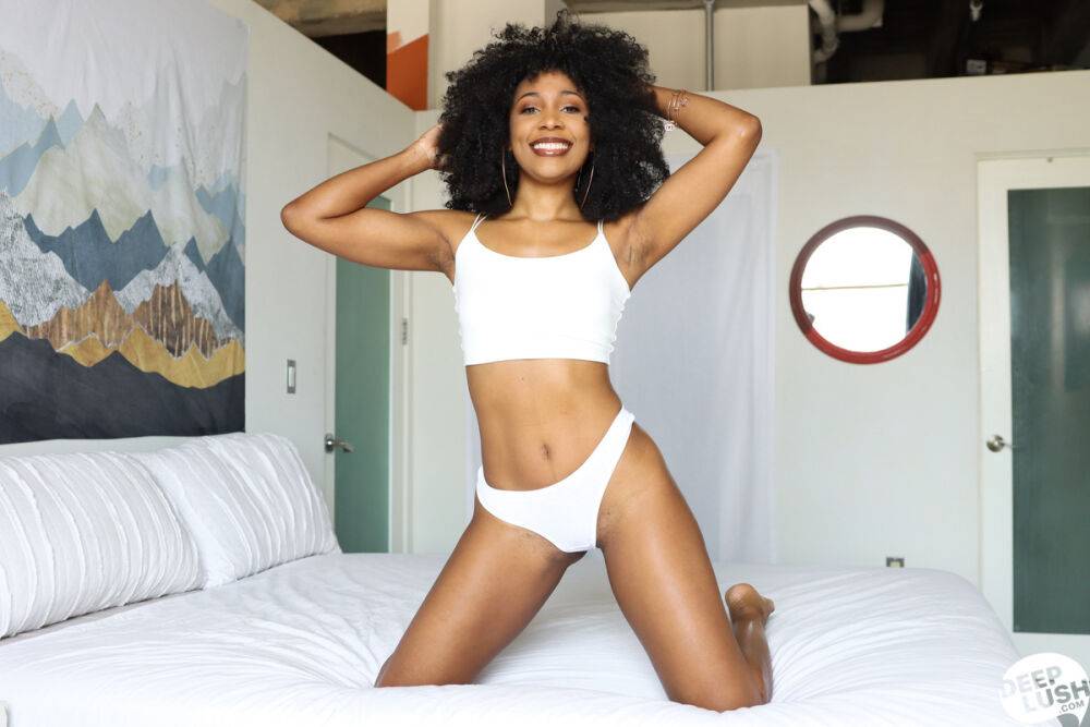 Ebony chick Olivia Jayy sports an afro while having POV sex on a bed - #3