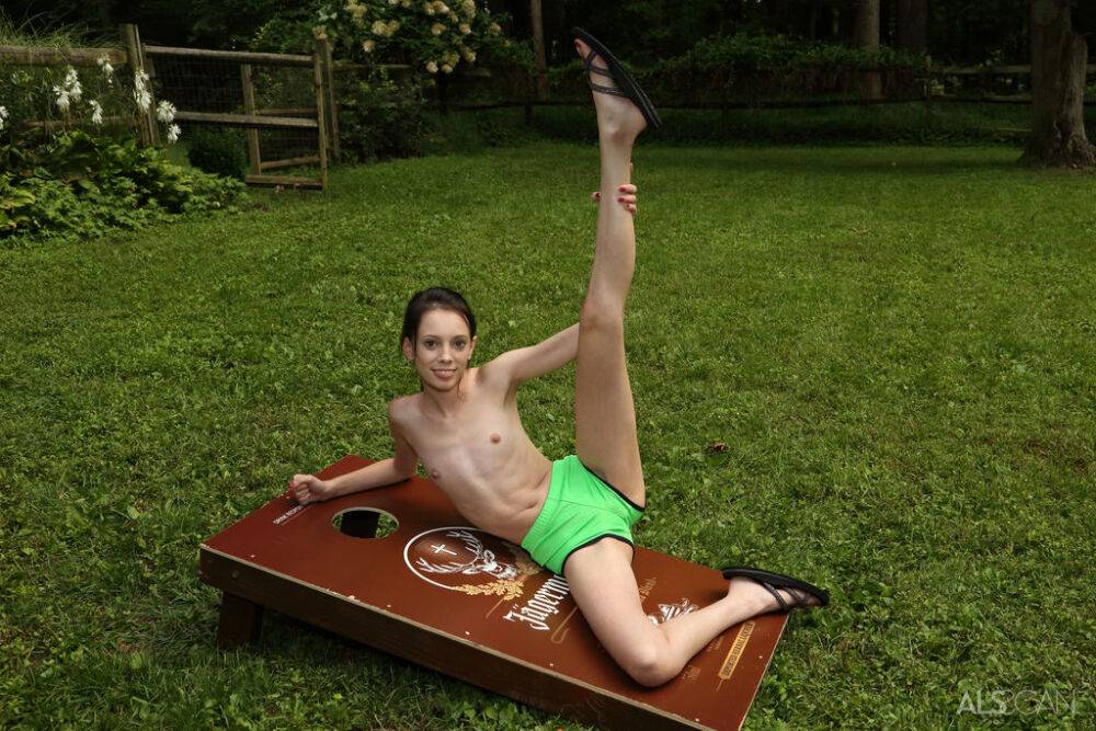 Slender brunette teen Aria Haze dildos her tight pussy atop bean bag toss - #16