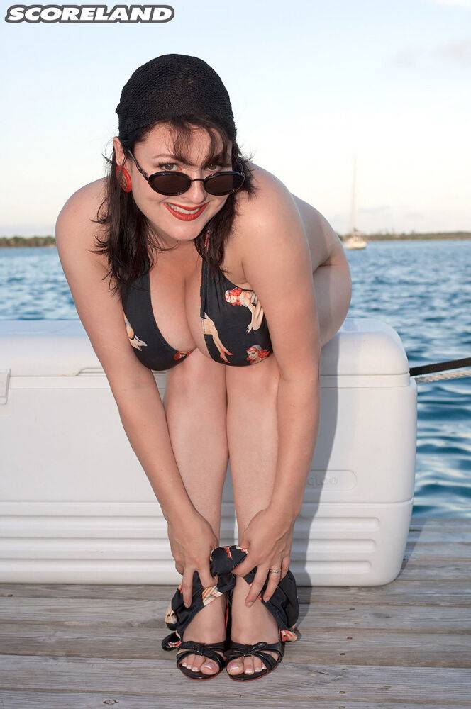 Busty beach babe Lorna Morgan strips her bikini on the pier to spread her legs - #12