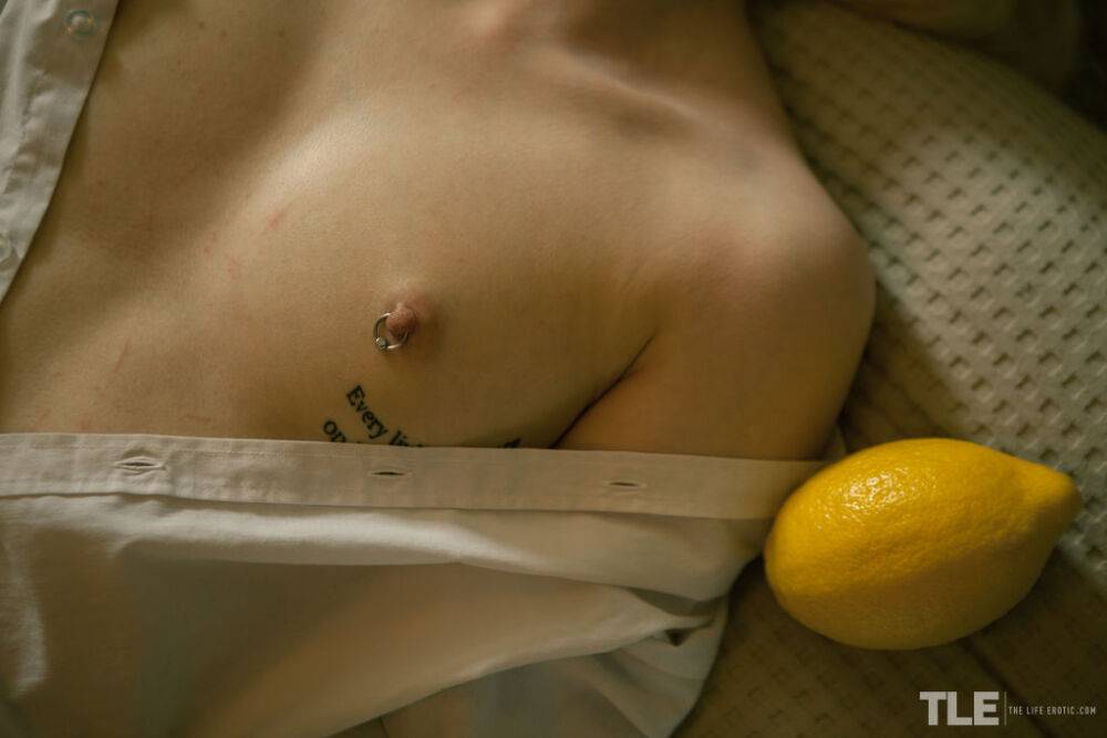 Alice Crowley sinks her teeth into lemon, letting it burst out over her tongue - #10