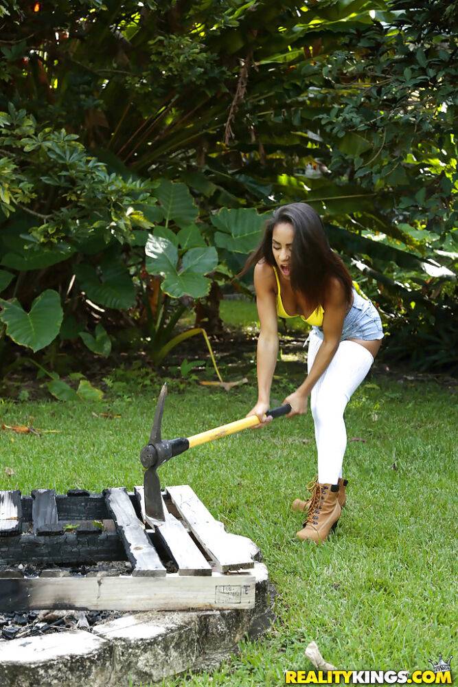 Busty black dime Nicole Bexley strutting outdoors in long socks and shorts - #11