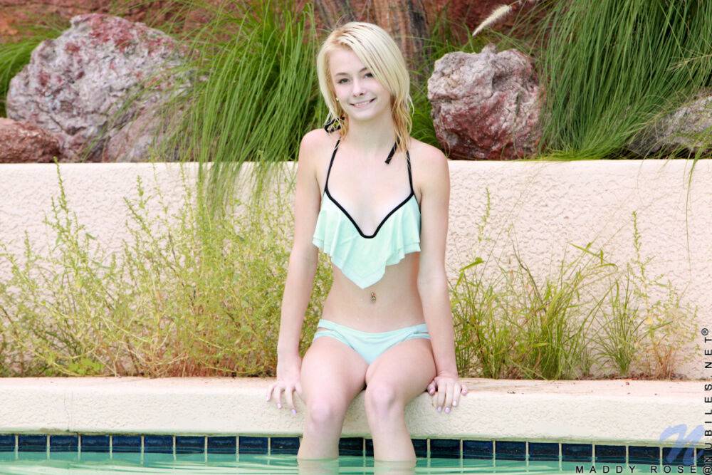 Young blonde Maddy Rose poses in a bikini during a poolside solo shoot - #4