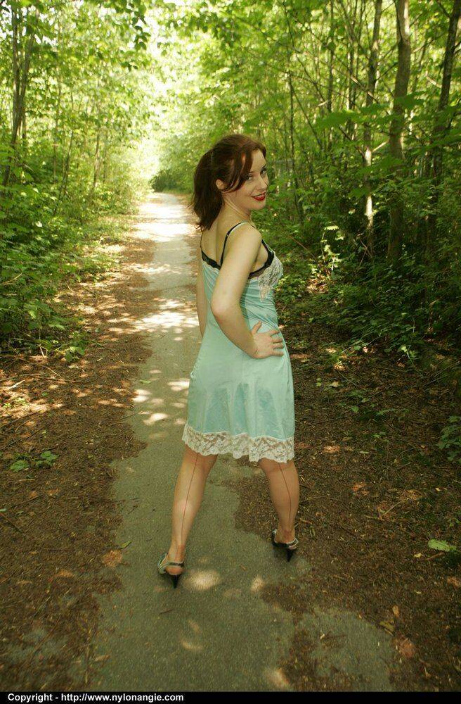 Amateur model removes a satin slip before exposing her tits and twat outdoors - #10