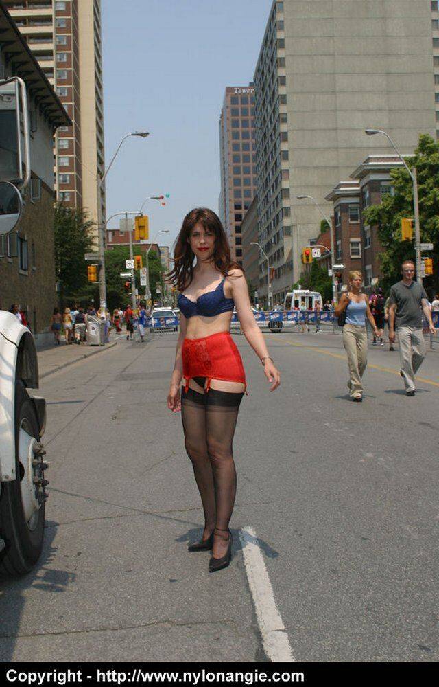 Amateur model wanders a public street in her underthings and a girdle - #4