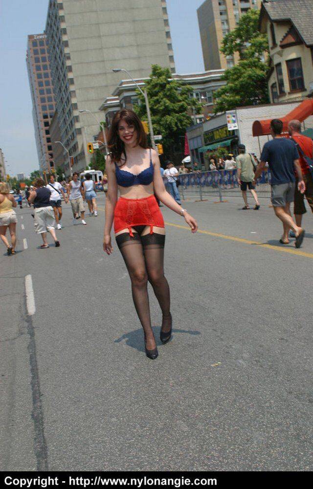 Amateur model wanders a public street in her underthings and a girdle - #3