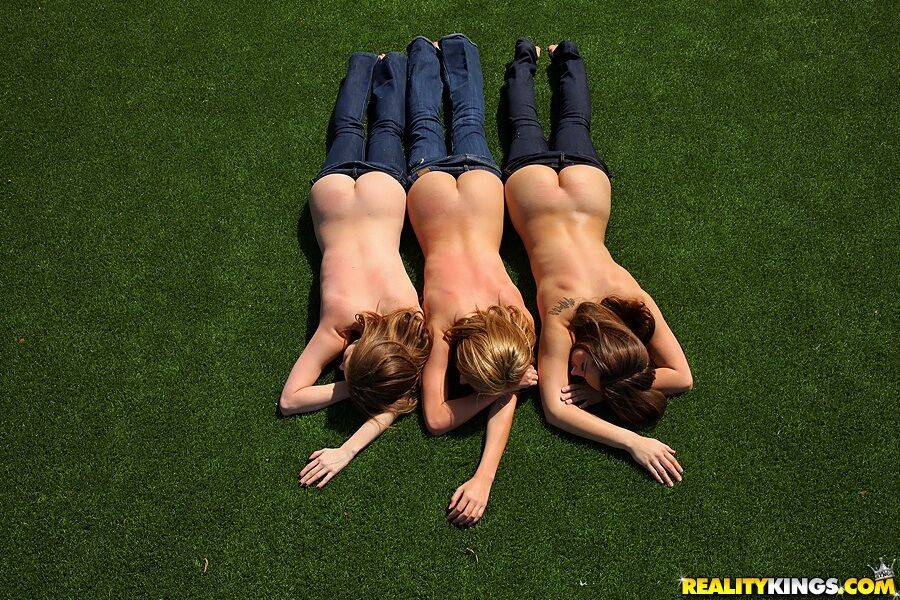 3 topless girls pull their blue jeans down over their bare asses on the lawn - #11