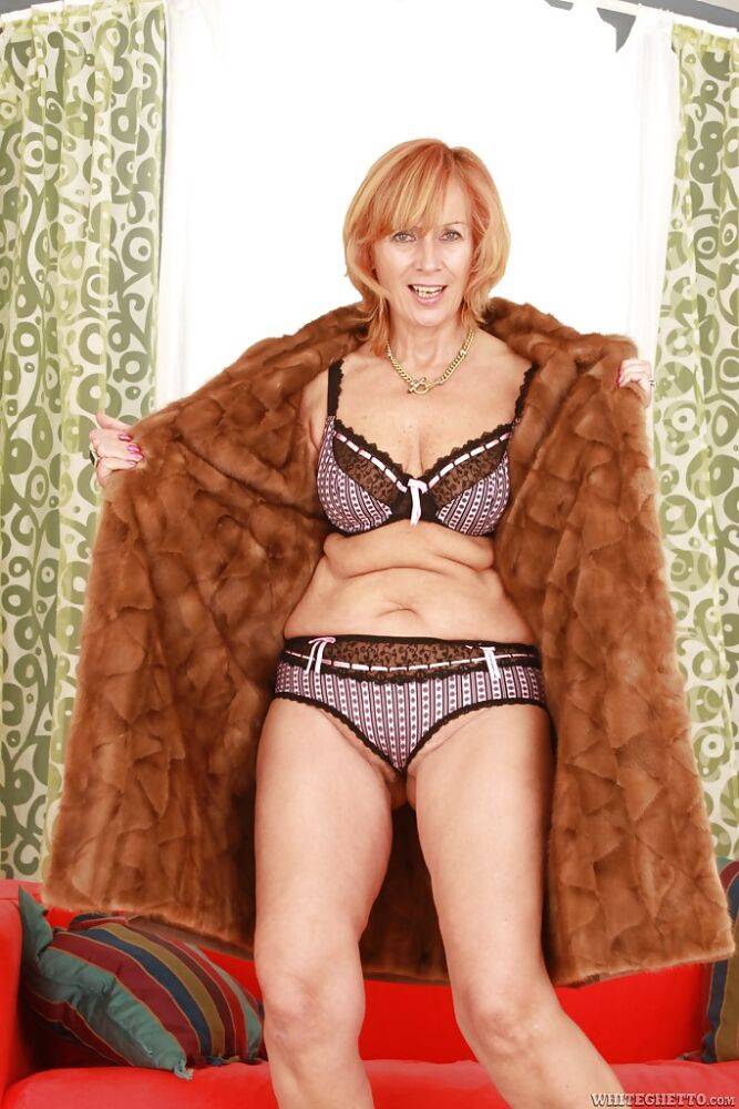 Blond mature seductress denudes from lingerie and poses topless - #8