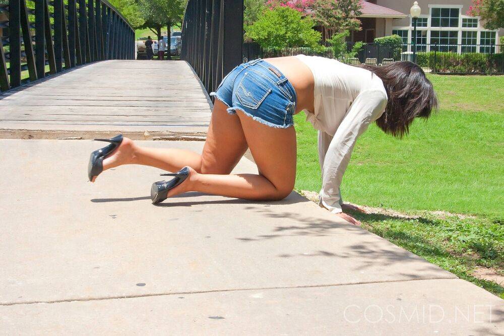 Hottie Shami Halil in booty shorts and white t-shirt posing in the sunshine - #13