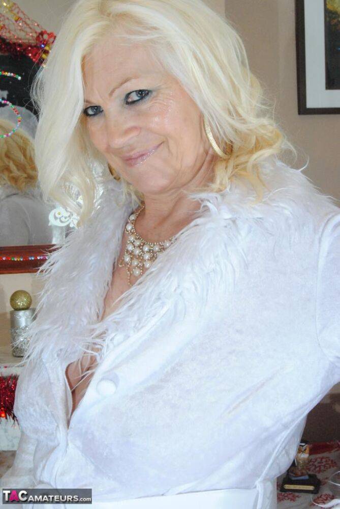 Older amateur Platinum Blonde shows her floppy tits in white panties & hosiery - #1