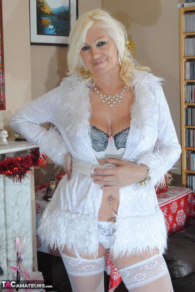 Older amateur Platinum Blonde shows her floppy tits in white panties & hosiery - #16