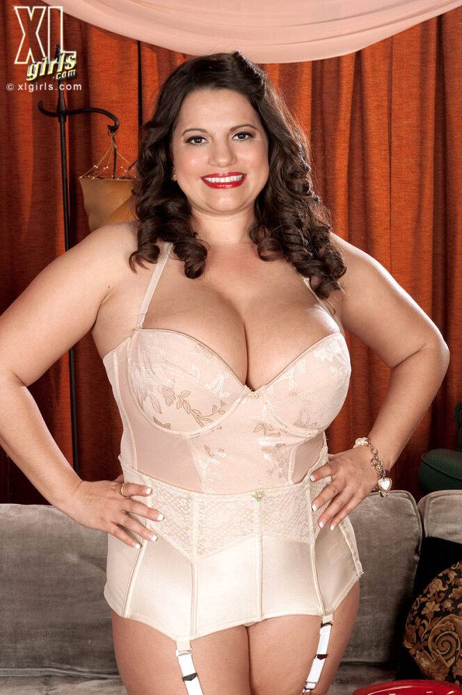 Solo BBW Melonie Max looses her huge tits from a girdle before removing nylons - #1