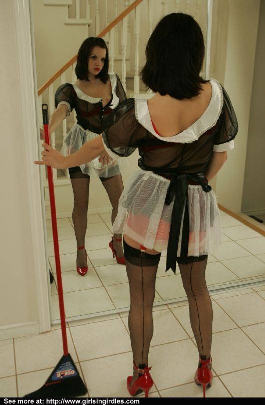 Brunette hottie in nylon stockings taking off her maid uniform - #4