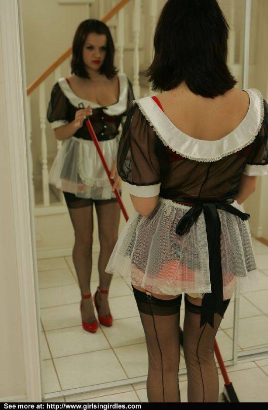 Brunette hottie in nylon stockings taking off her maid uniform - #9