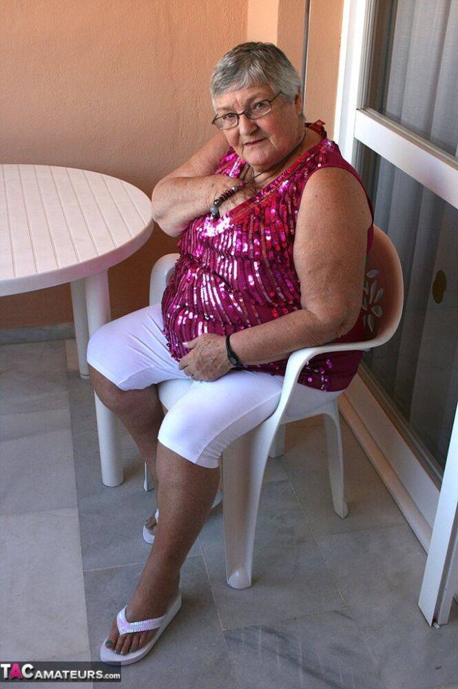 Obese grandmother GrandmaLibby parts her labia lips after disrobing on balcony - #11