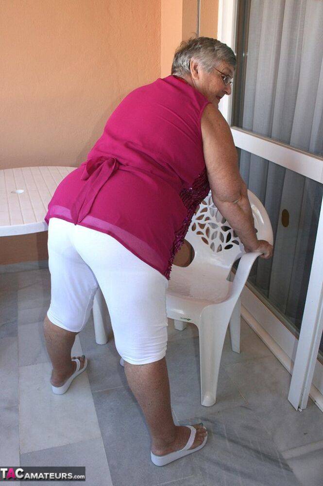 Obese grandmother GrandmaLibby parts her labia lips after disrobing on balcony - #10