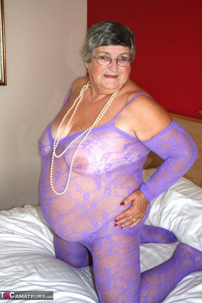 British fatty Grandma Libby masturbates on a bed in a crotchless bodystocking - #2