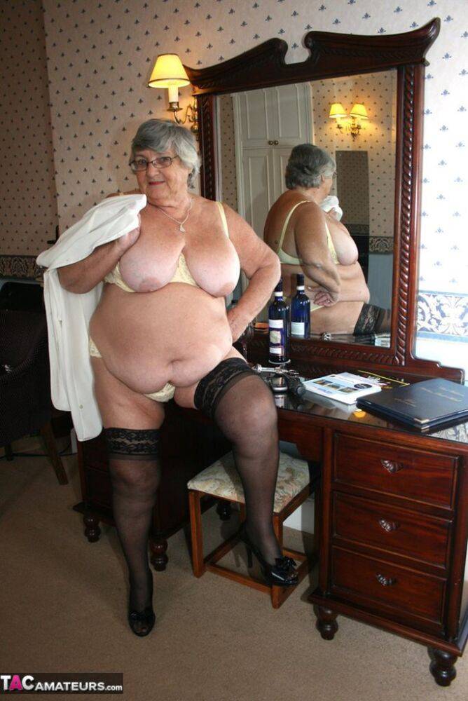 Fat grandmother with short grey hair has phone sex in black stockings only - #10