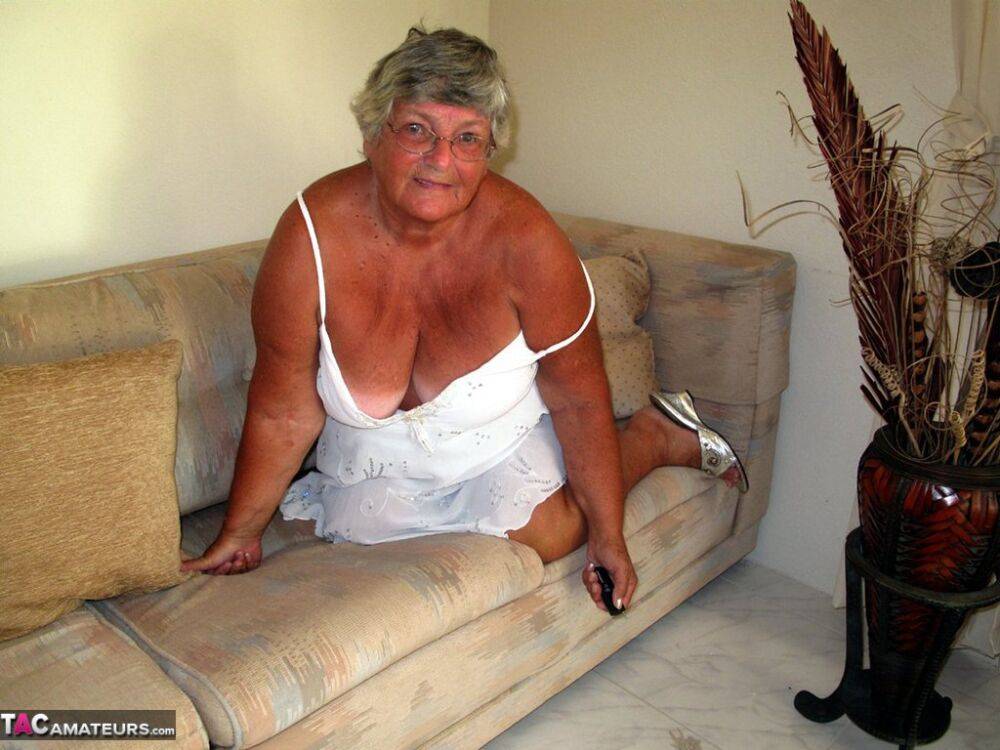 Fat lady Grandma Libby bares her saggy tits and big ass while on a couch - #8