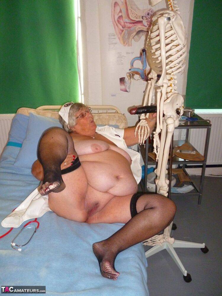 Fat old nurse Grandma Libby attaches a dildo to a skeleton for sexual relief - #13