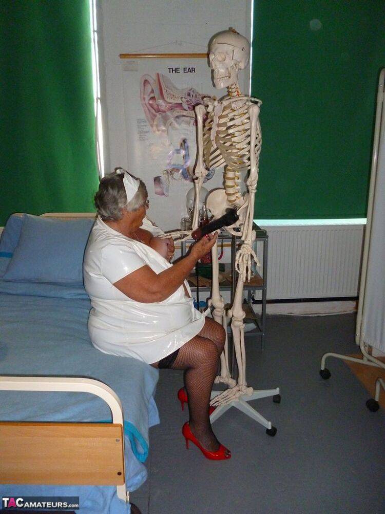 Fat old nurse Grandma Libby attaches a dildo to a skeleton for sexual relief - #15