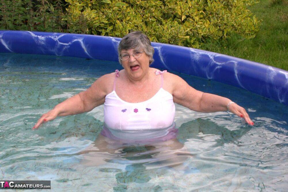 Overweight UK nan Grandma Libby exposes her boobs in a backyard swimming pool - #2