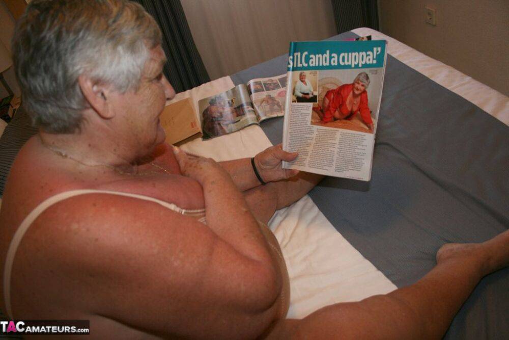 Fat British lady Grandma Libby masturbates while perusing a girly magazine - #11