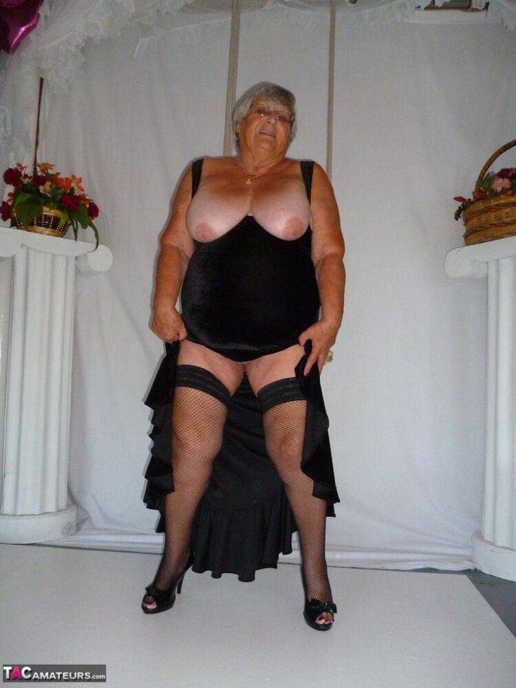 Fat nan Grandma Libby takes off a black dress to model naked in stockings - #4