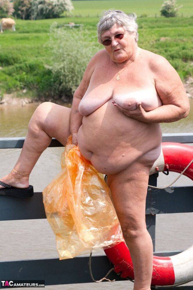 Obese oma Grandma Libby doffs a see-through raincoat to get naked on a bridge - #10