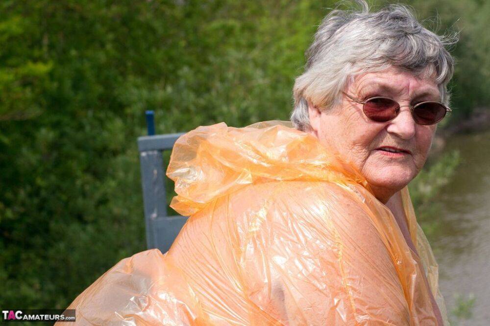 Obese oma Grandma Libby doffs a see-through raincoat to get naked on a bridge - #2