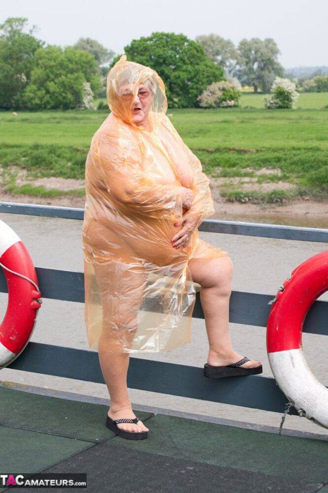 Obese British amateur Grandma Libby casts off a see-through raincoat - #9