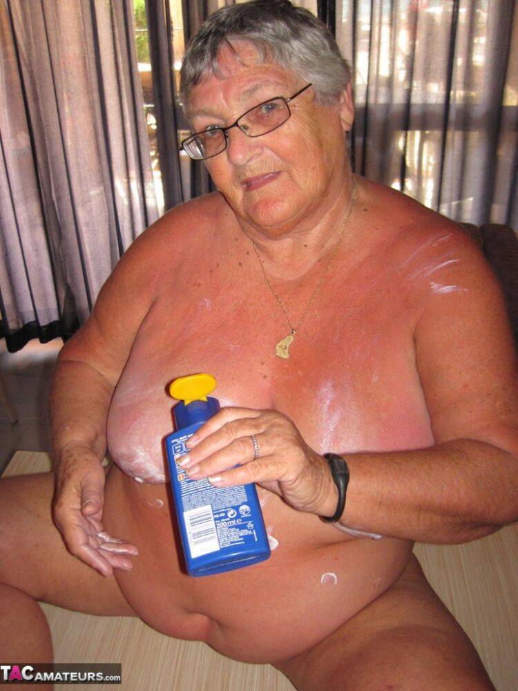 Obese old woman Grandma Libby covers her naked body in lotion - #7
