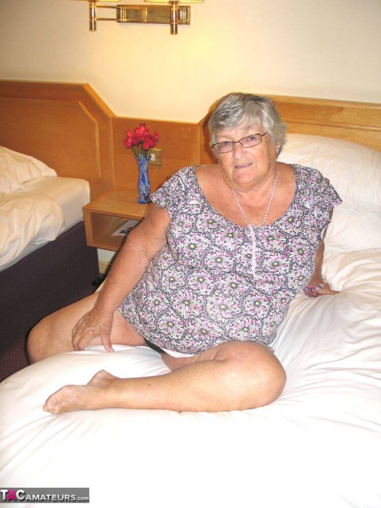 Silver haired British woman Grandma Libby exposes her fat body on a bed - #15