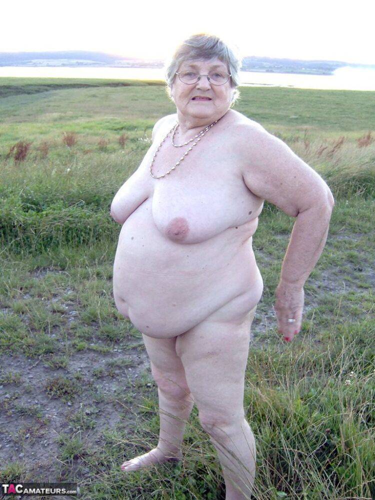 Fat nan Grandma Libby steps into a puddle before covering herself in mud - #16