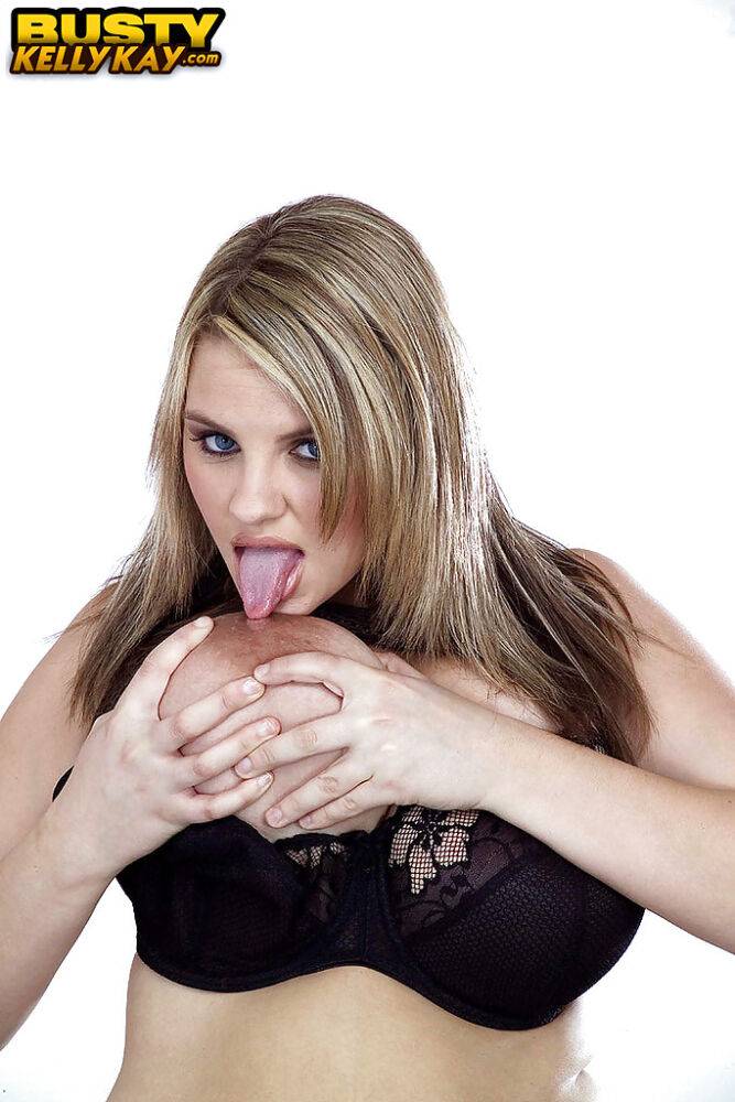 Euro pornstar Kelly Kay loosing huge tits from see thru top before toying twat - #5