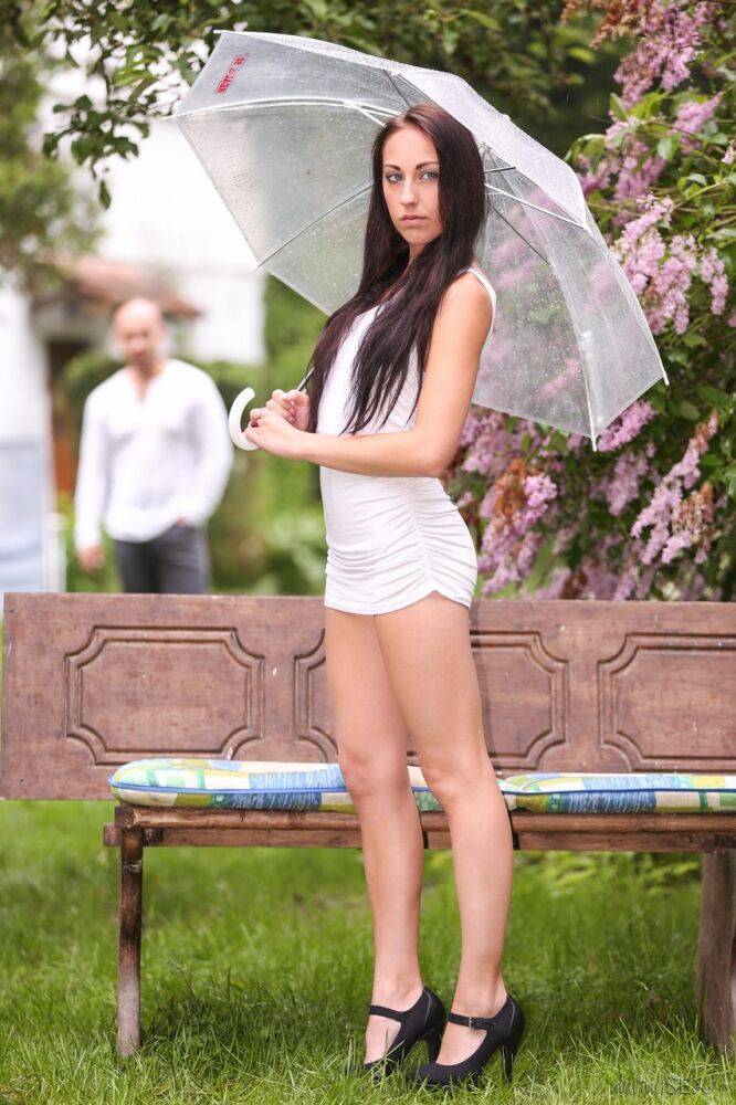 White girl El Storm holds a parasol before intercourse on a park bench - #6