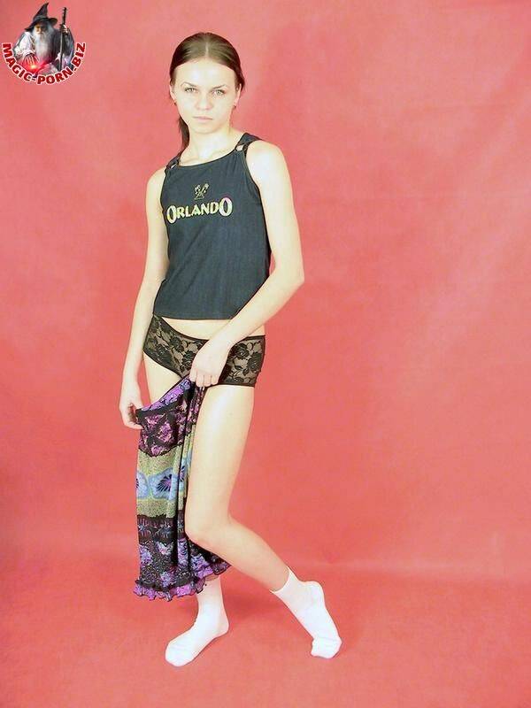 Petite teen strips down to white socks in a confident fashion - #16